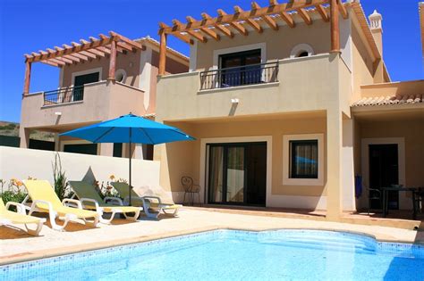 The master bedroom includes an en-suite shower-room and direct access to the balcony. . Long term rentals burgau portugal